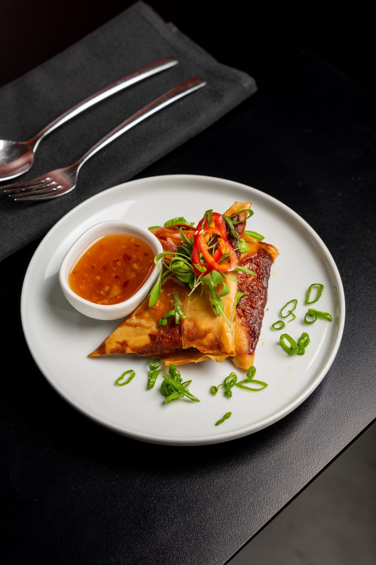Crispy spring rolls with chili dipping sauce